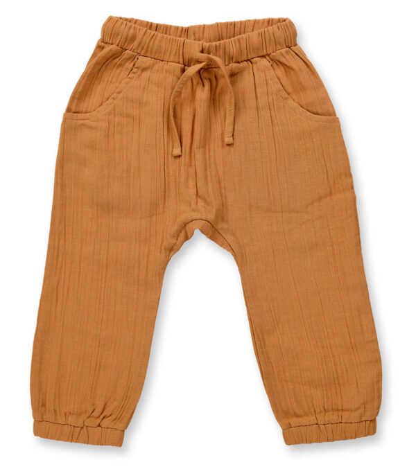 Soft summer trousers made of muslin caramel brown